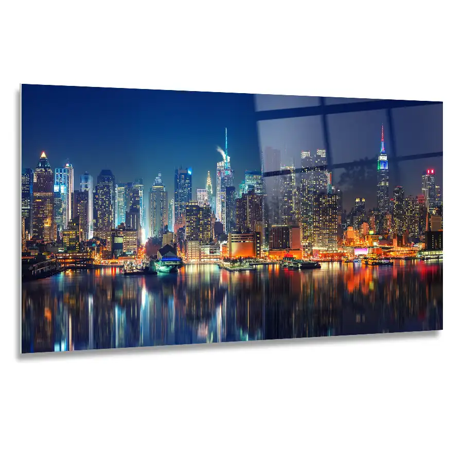 277637491_120x60cm A 120x60cm landscape glass print of the skyline of Manhattan at night, with glowing lights reflected on the water.