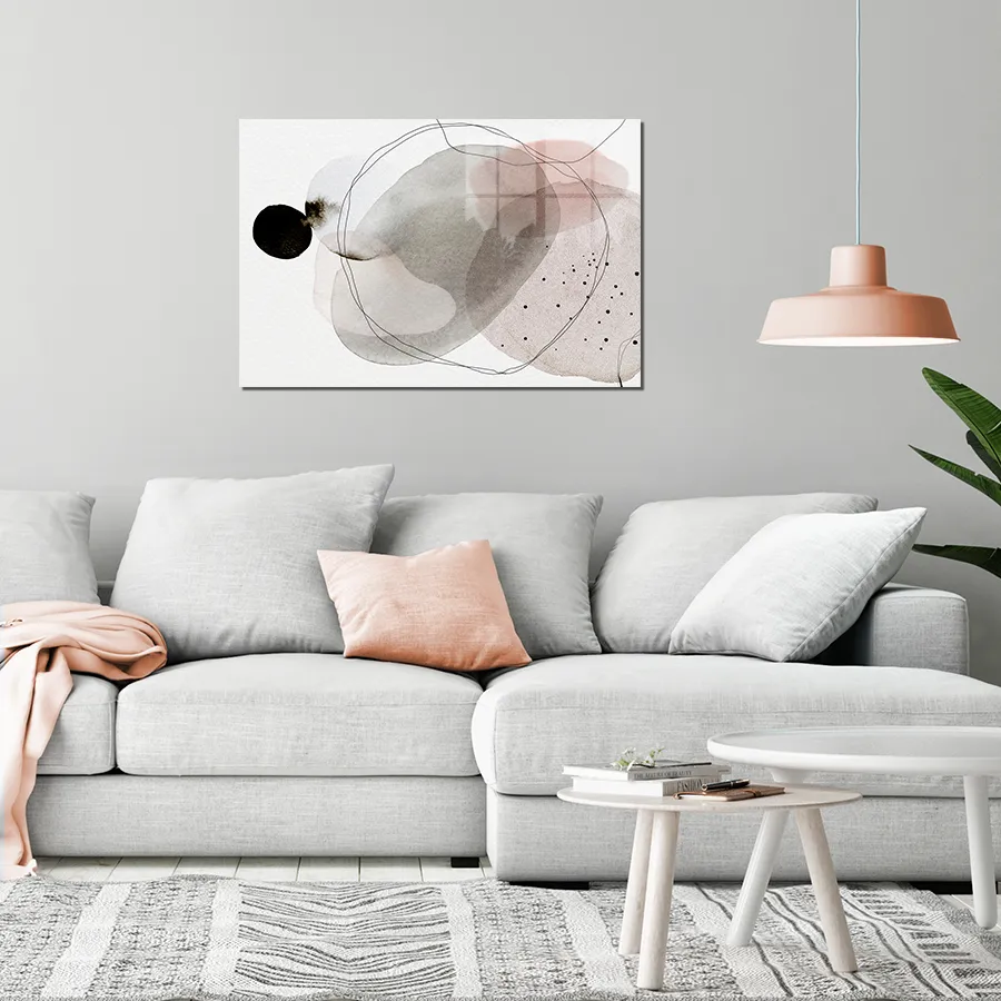 110167489-mineral-moon-lifestyle abstract glass wall art combines watercolour washes with bold ink lines, hanging above. modern sofa
