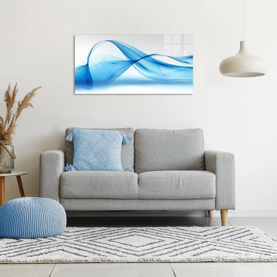 305191451-blue-silk-wave-lifestyle glass wall art of a flowing blue smoke like wave hanging on the wall of a modern living room